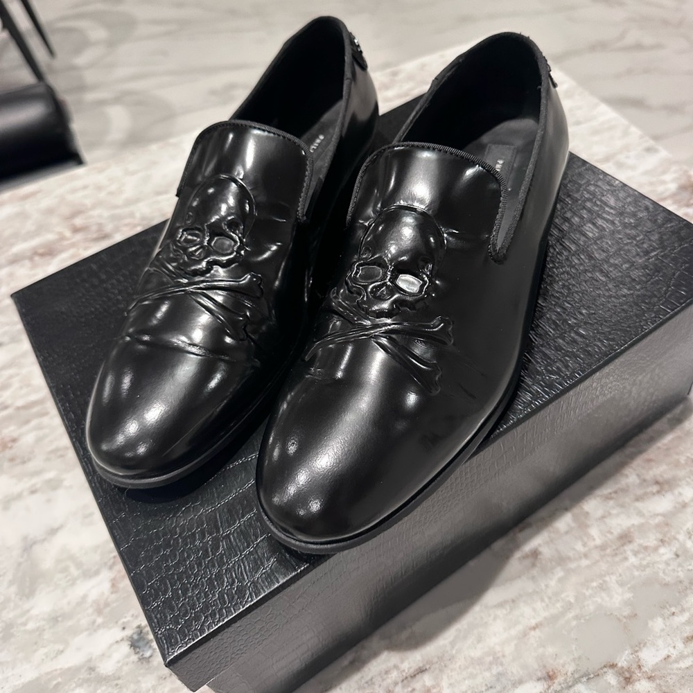 Skull branded Phillip Plein dress shoes